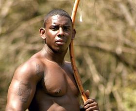 Hunky nude black tribes man showing his enormous cock